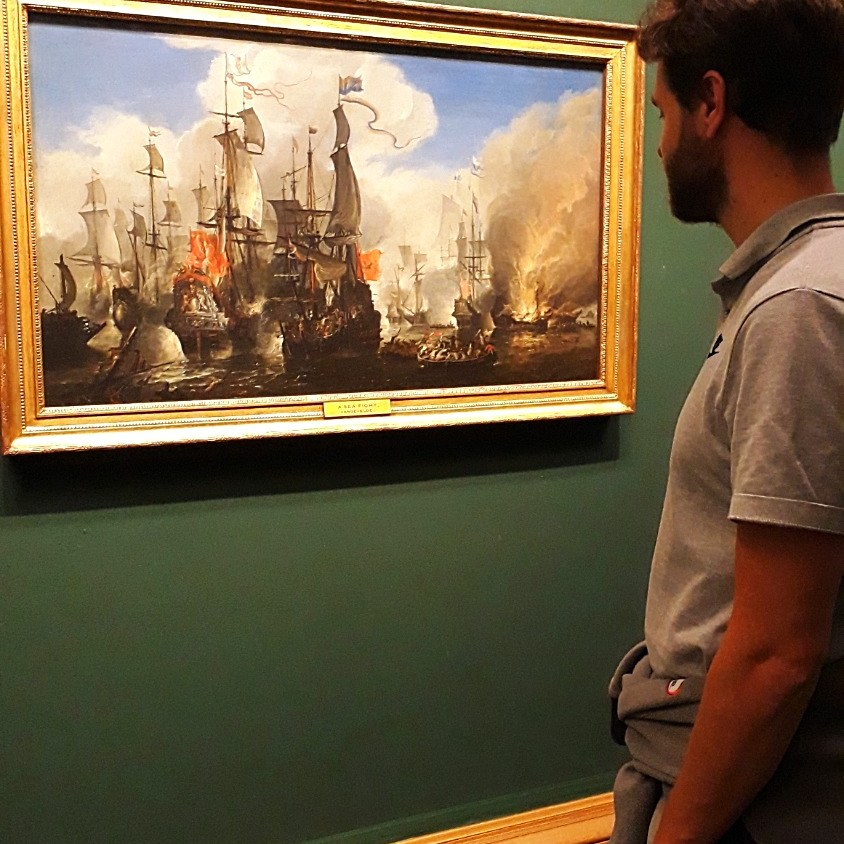 A Dutchie admiring a Dutch painting